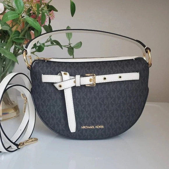 Michael Kors Handbags - Michael Kors half moon crossbody